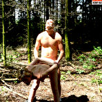 Pic of Horny mature slut taken in the forest by a masked man