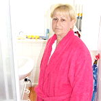 Pic of naughty housewife getting dirty in her bathtub