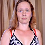 Pic of Horny mature slut playing on the couch