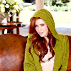 Pic of Elle Alexandra Slim Redhead Spreads on a Leather Sofa