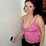 Pic of Busty Girl Sucking and Jerking Off Guys in the Gloryhole