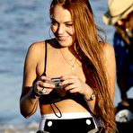 Pic of Lindsay Lohan shows cleavage in black bikini in Malibu