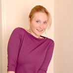 Pic of Blonde in black stockings shows her bushy pussy