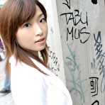Pic of Naughty Koto takes off her top to show tits
