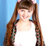 Pic of Pigtails Teen Spreading Hairy Pussy