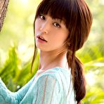 Pic of 
      Marica Hase sensually stripping nude in the garden
    