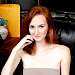 Pic of Dee Dee Lynn Strips In An Office Chair