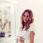 Pic of Amanda Booth posing pregnant at home