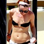 Pic of Juliette Lewis in black bikini on the beach in mexico