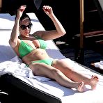 Pic of Kelly Brook deep cleavage in green bikini