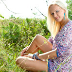 Pic of Absolutely incredible teen model stripping and posing in the nude outdoors on the nature.