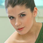 Pic of Horny teen brunette Luiza A strips her green shirt and unveils her perky boobs and nipples. - TheMetArt.com