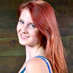 Pic of SexPreviews - Ashley Lane redhead rope bound with tits exposed and ass toyed