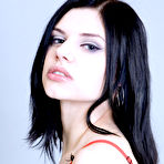 Pic of Classy brunette vixen Belle A takes off her sexy red corset and shows us her massive jugs. - TheMetArt.com