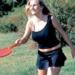 Pic of Clubseventeen busty teen amateur showing boobies on a public field
