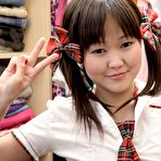 Pic of Tiny Asian school girl Alicia shudders in pleasure when she discovers her pussy.