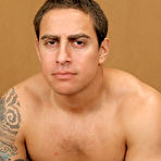 Pic of Muscular hot guy with tattoo stroking his big cock