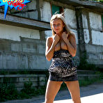 Pic of Public flashing - Hot kitty caught flashing her juggs in a backstreet