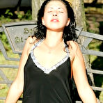 Pic of Pantyhosed chick in tempting red dress eagerly fingering her yummy pussy