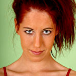 Pic of Redhaired Coed Hottie Teases Her Bald Pussy With A Big Dildo