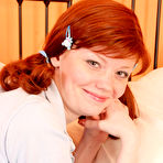 Pic of Masturbating Pigtails Redhead Teen