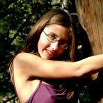 Pic of Geeky teen in glasses shows ass outdoors