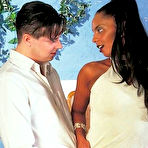 Pic of Stunning ebony babe getting seduced by white guy