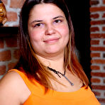 Pic of Busty spreads her buns shamelessly behind the camera