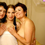 Pic of Two mature lesbians having fun with a hot and kinky teen