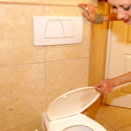 Pic of This mature slut gets kinked up on the toilet