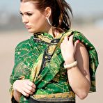 Pic of Cassandra Calogera shows big tits from pink bikini @ Busty Cafe