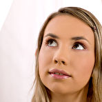 Pic of Petite Virgin Brigitt Showing Her Shaved Pussy