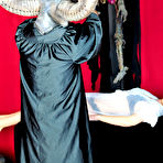 Pic of Busty Satanic Babe Brandy seducing a priest in the evil church