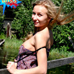Pic of Public flashing - Busty teen gives her hole a rubbing on a bridge