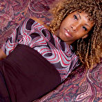 Pic of Banana sucking ebony shemale shows ass