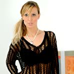 Pic of Milly Moris shows natural boobs from black lingerie @ Busty Cafe