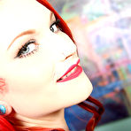 Pic of Punk babe Aurora Rose does footjob on a black Dick