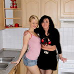 Pic of Strap on MILF fucking a hot teeny babe