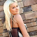 Pic of Natasha Lane posing in tiny black thong