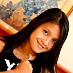 Pic of Alluring asian teenie Kat Young fingerin and posing on bed