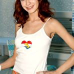 Pic of Clubseventeen Busty teen redhead showing her pink pussy