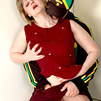 Pic of Matures and Pantyhose - Lusty mature chick in shiny hose petting herself looking at nude hung chap