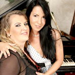 Pic of Hot babe licking and fisting a mature lesbian