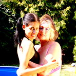 Pic of Hot babe fisting a mature lesbian on the counter