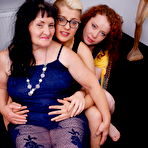 Pic of Two naughty young babes sharing a mature lesbian