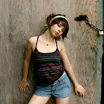 Pic of Ariel Rebel - Horny babe Ariel Rebel posing at the wall and shows her tiny tits and perfect ass