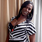 Pic of Horny black shemale plays with shecock