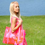 Pic of Marina C - Marina C takes her sexy dress outdoors on the field and shows us her hot ass.