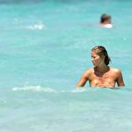 Pic of Elena Santarelli boobslip and ass crack on the beach
