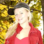 Pic of Lovely Anne - Cute pigtailed blonde Lovely Anne takes off her blue jeans and shows her tight ass.